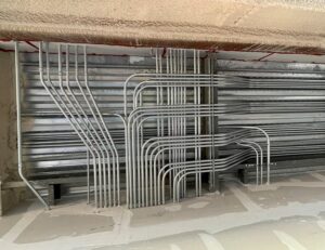 Overhead commercial electrical conduit in Wisconsin displays work done by E-Con Electric contractors